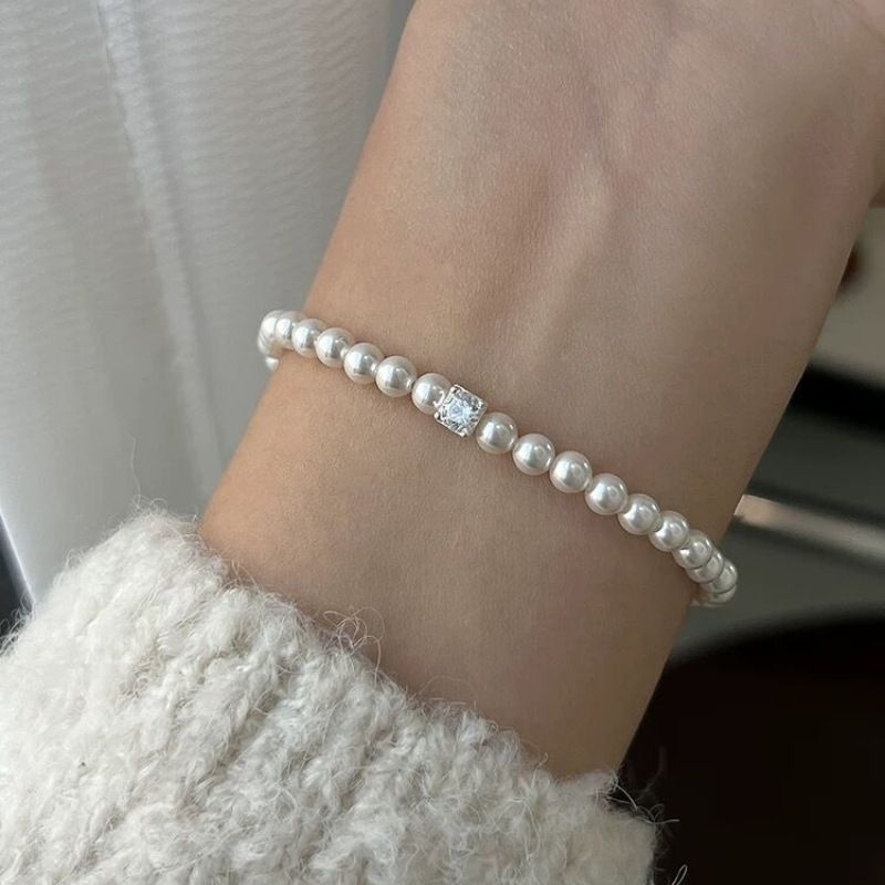 Piccolo squisito cubo di zucchero in zircone Shijia perla elastico leggero elegante braccialetto francese gioielli per ragazze all'ingrosso_voghion.com
