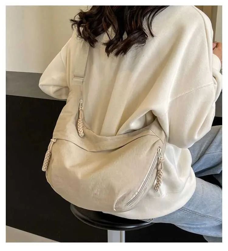 Sac à bandoulière en nylon 2024 pour femme, nouvelle collection été, grande capacité, design polyvalent et de niche, messager Ba241103_voghion.com