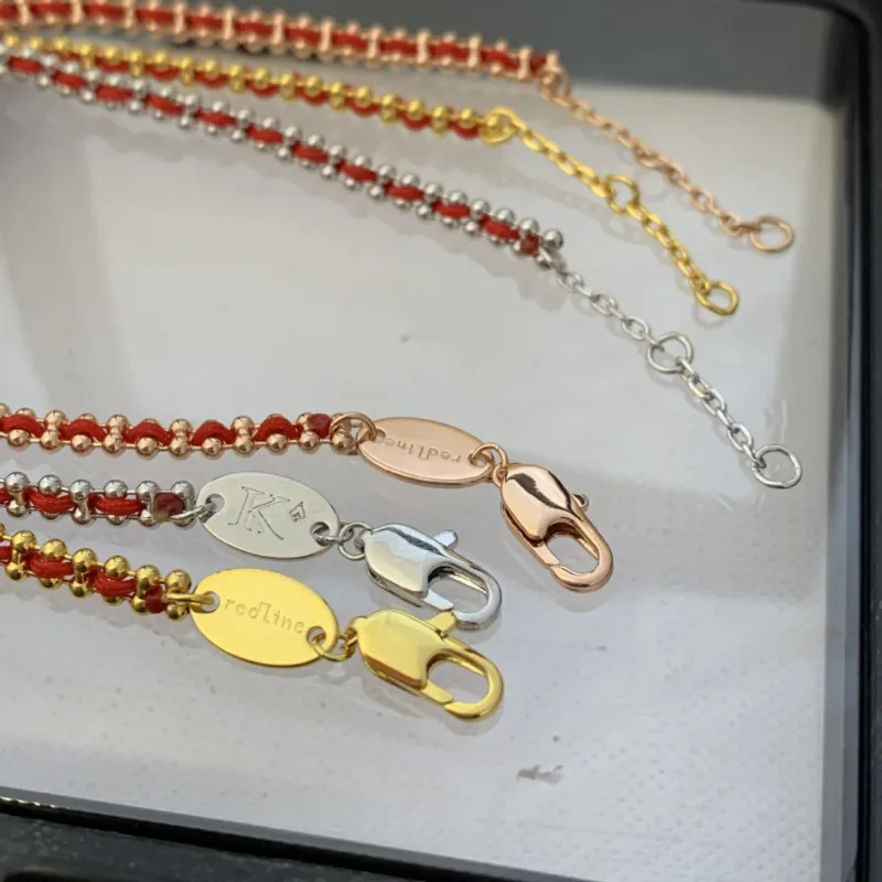 2024 Nueva pulsera de cuerda torcida tejida de la suerte con revestimiento francés caliente Pulseras de oro Brazalete Joyería_voghion.com