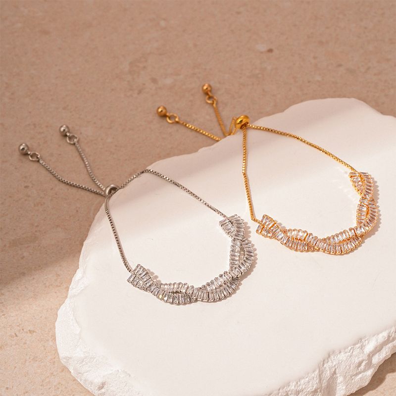 Braccialetto con croce in zircone intrecciato di alta qualità, gioiello leggero e versatile_voghion.com