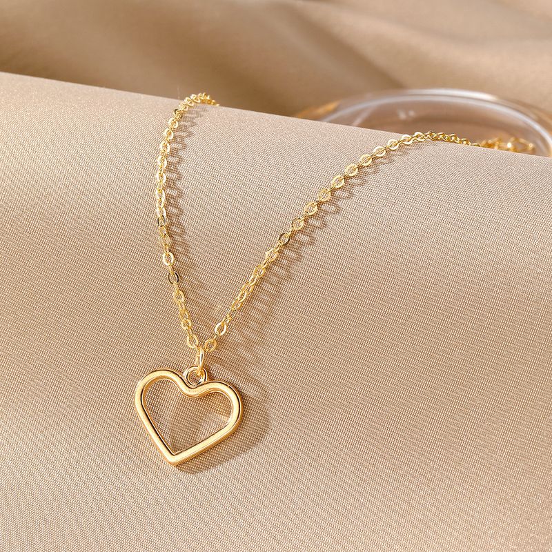 Liebesanhänger Halskette für Frauen hohler Stil hochwertiger Sinn für alle Spielpullover Schlüsselbeinkette Schmuck_voghion.com