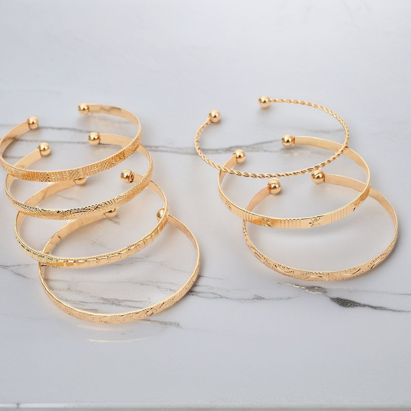 Retro Personality Exaggerated Wide Gold Glossy Multi Element Set Bracelet_voghion.com