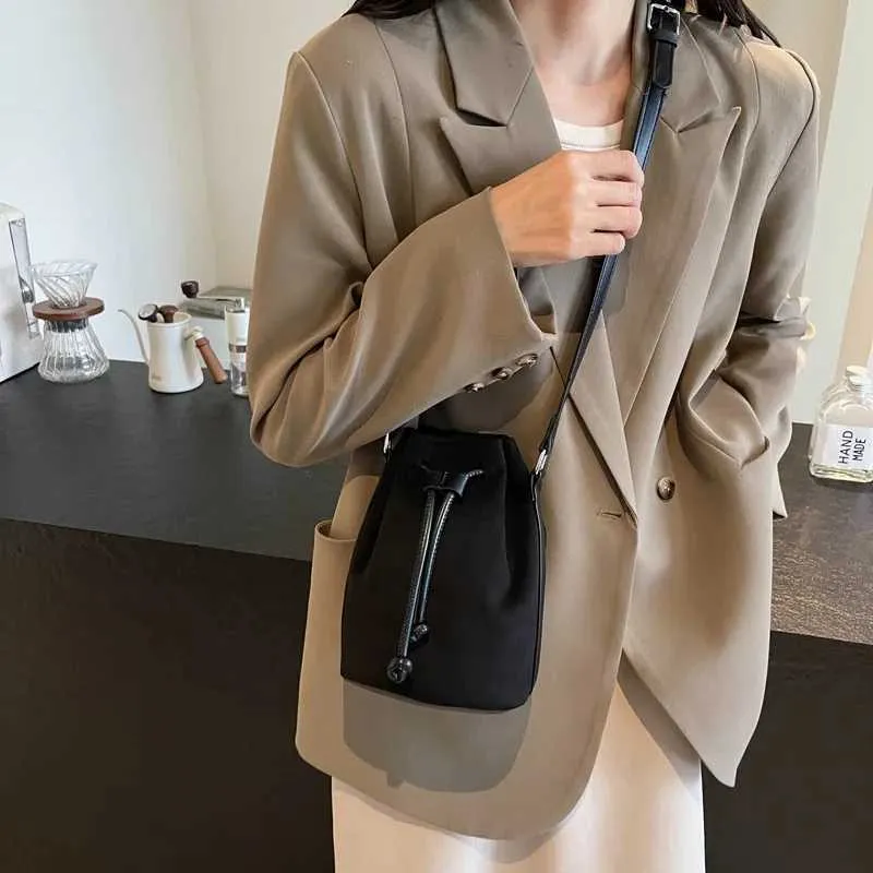 Suede Drstring Small Shoulder Bag Dark BrownC241217_voghion.com