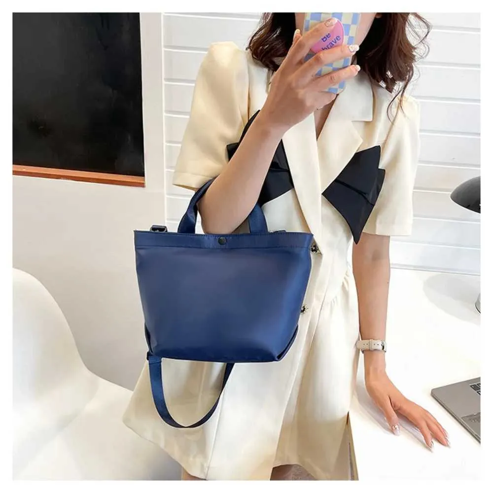Vintage 2024 Nei Grousskapazitéit Handtasche Damen Nylon Stoff Schëllertasche Koreanesch Einfach PU Crossbody Taschen Dammen_voghion.com