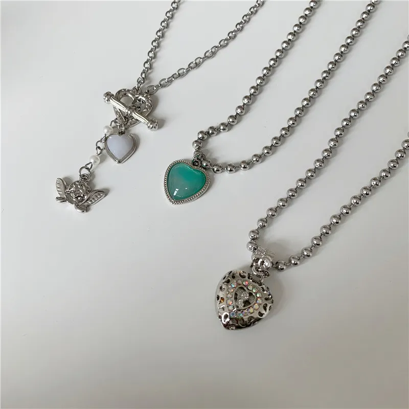 Collana con pendente a cuore e angelo da donna con strass e chiusura_voghion.com