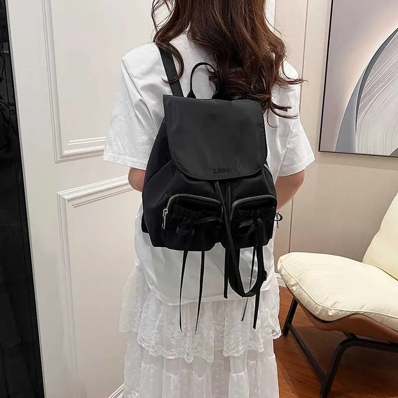 Bogen Design Frauen Kleine Nylon Rucksäcke 2024 Frühling Y2K Koreanische Mode Einfarbig Rucksack Dame Reise_voghion.com
