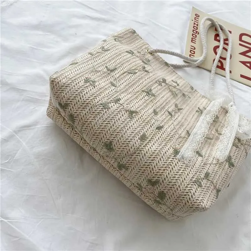 2024 New Summer Wenfei Woven Fem All Mah Portable Bucket Designer Handbag Picnic Bag Y241109_voghion.com