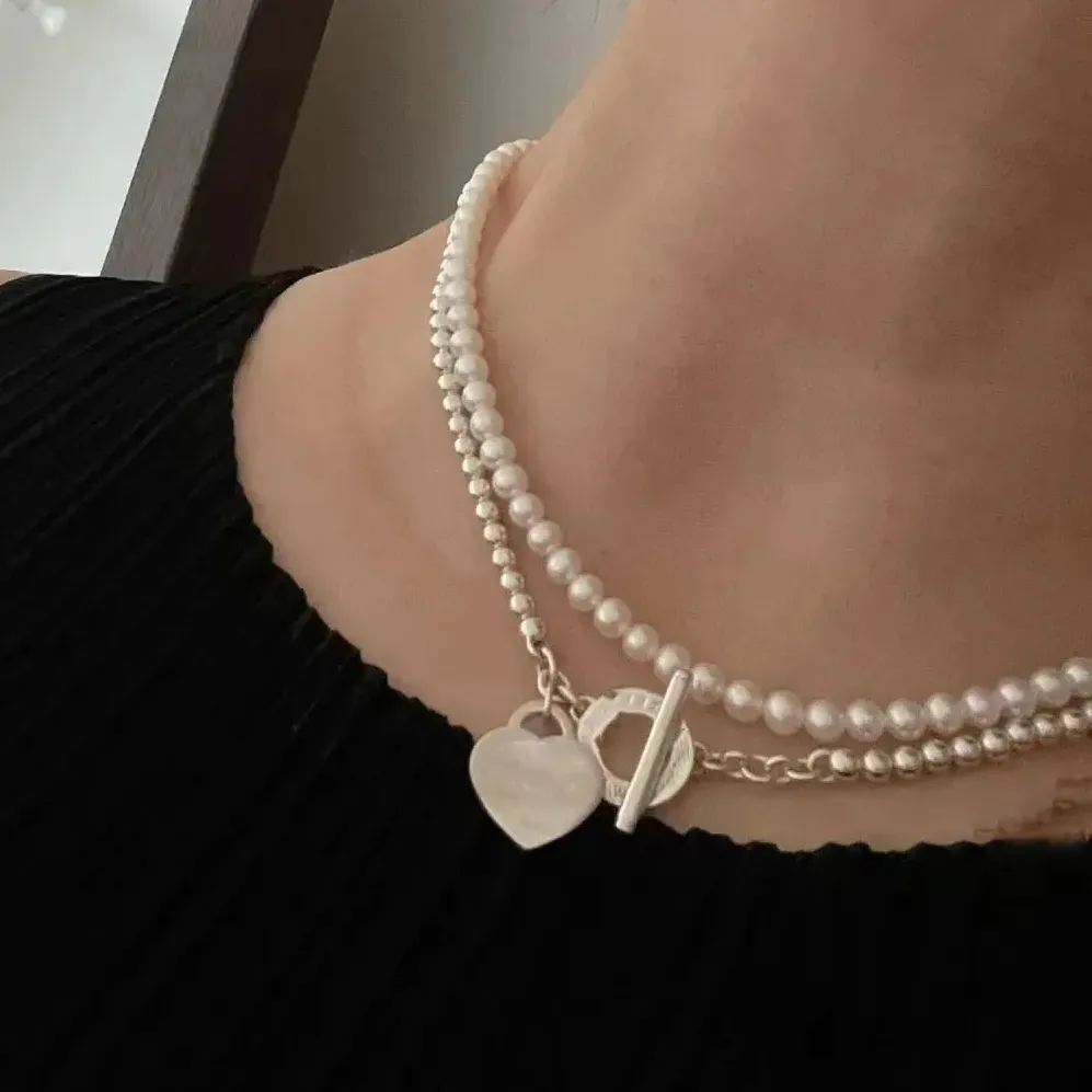 Collana di stilista di moda torna a ciondolo gioielli a forma di cuore catene a due piani con collane di perle festa oro rosa_voghion.com