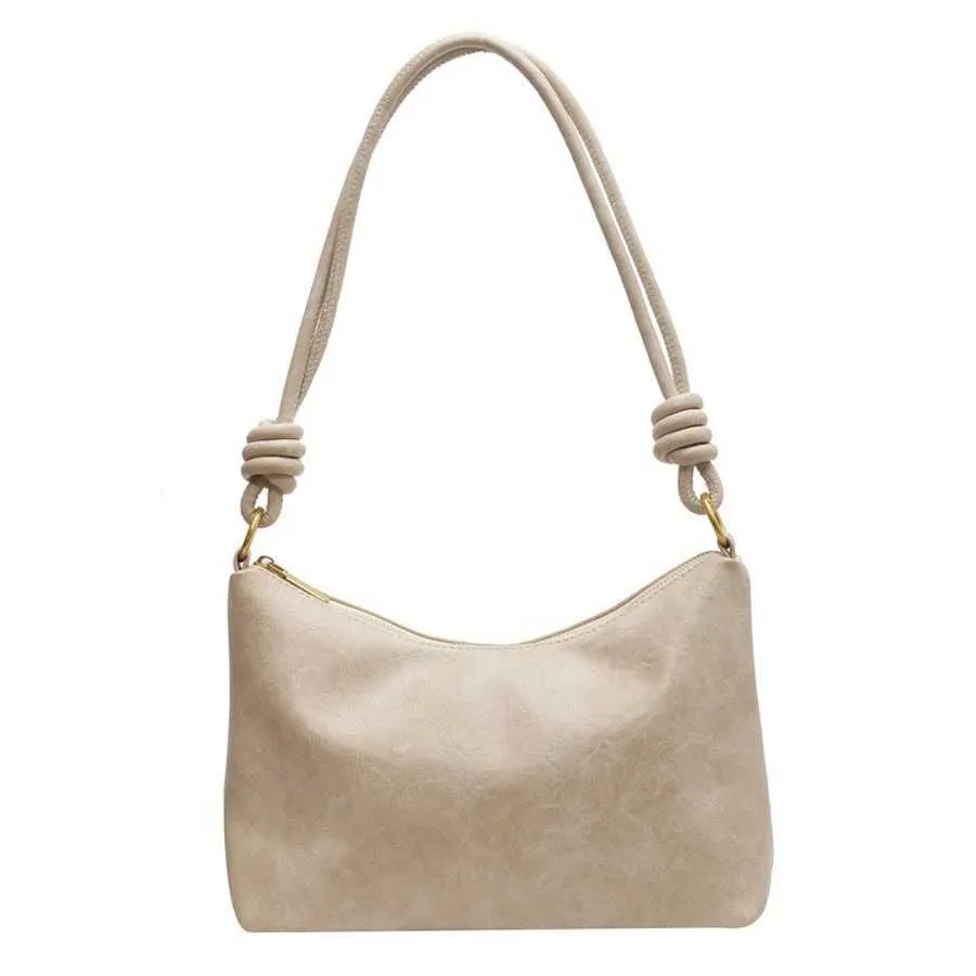 Borsa a tracolla da donna con texture in pelle morbida geometrica_voghion.com