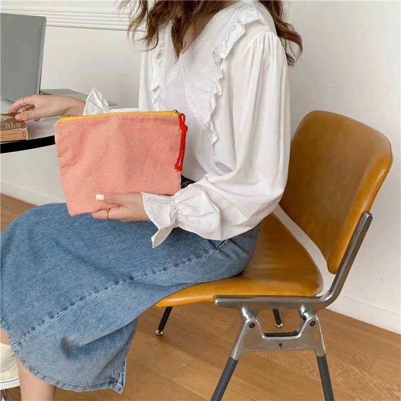 2024 ass hot College Style Kontrastfaarf Portable Reissverschluss Reeshandtasche Buedzëmmer Make-up Tasche Y241023_voghion.com