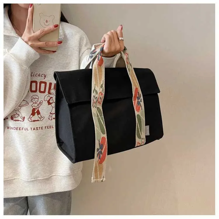 Stor axelremsväska i canvas och crossbody för damer_voghion.com