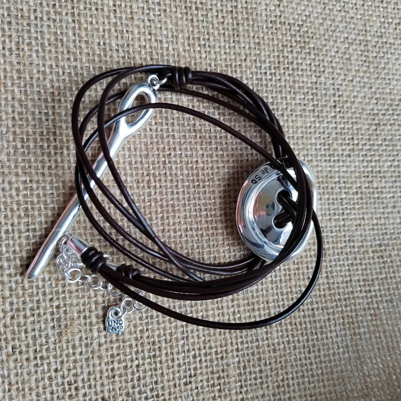 Catene MAGGIO 2023 Moda Alta Qualità Spagnolo Unode Pulsante Corda di Pelle Collana Accessori Regalo All'ingrosso_voghion.com