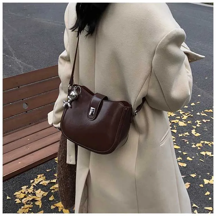 Borsa a secchiello Bury da donna, solida, alla moda, in pelle PU, con tracolla, versatile, per il tempo libero, con catena, semicerchio_voghion.com