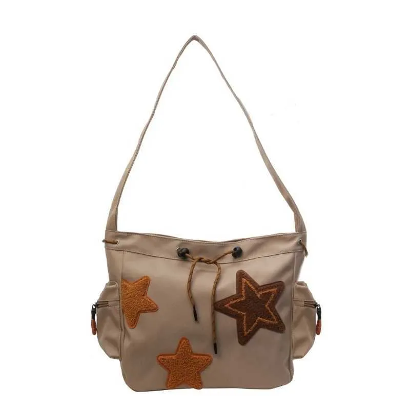 Borsa a tracolla a forma di stella in tela da donna, zaino per studenti Y241116_voghion.com