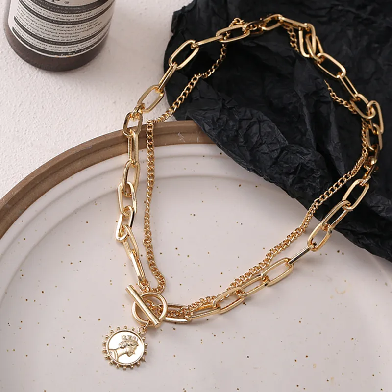 Collana multistrato vintage oro con pendente per donna_voghion.com