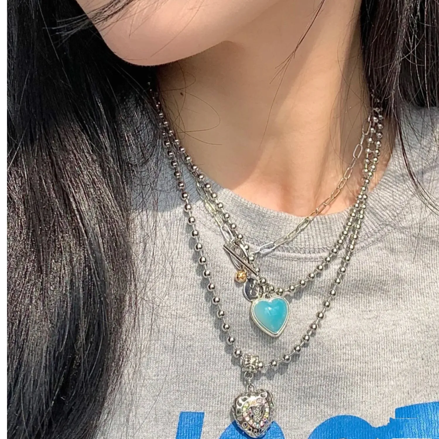 Collana con pendente a cuore e angelo da donna con strass e chiusura_voghion.com