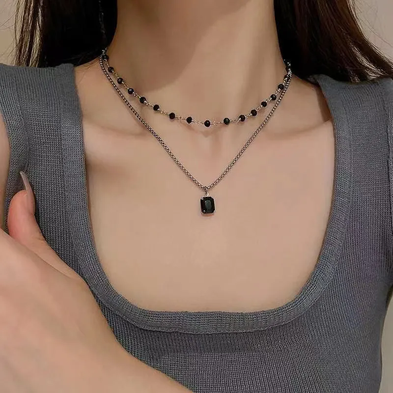 Collana girocollo a doppio strato con perline nere donna_voghion.com