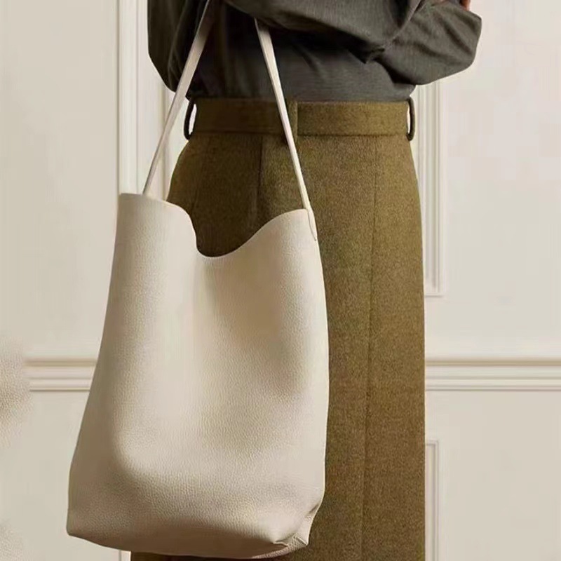 The Row, fascia media a secchiello in vera pelle con pelle di vacchetta per l'autunno inverno, borsa tote di piccola e grande capacità_voghion.com