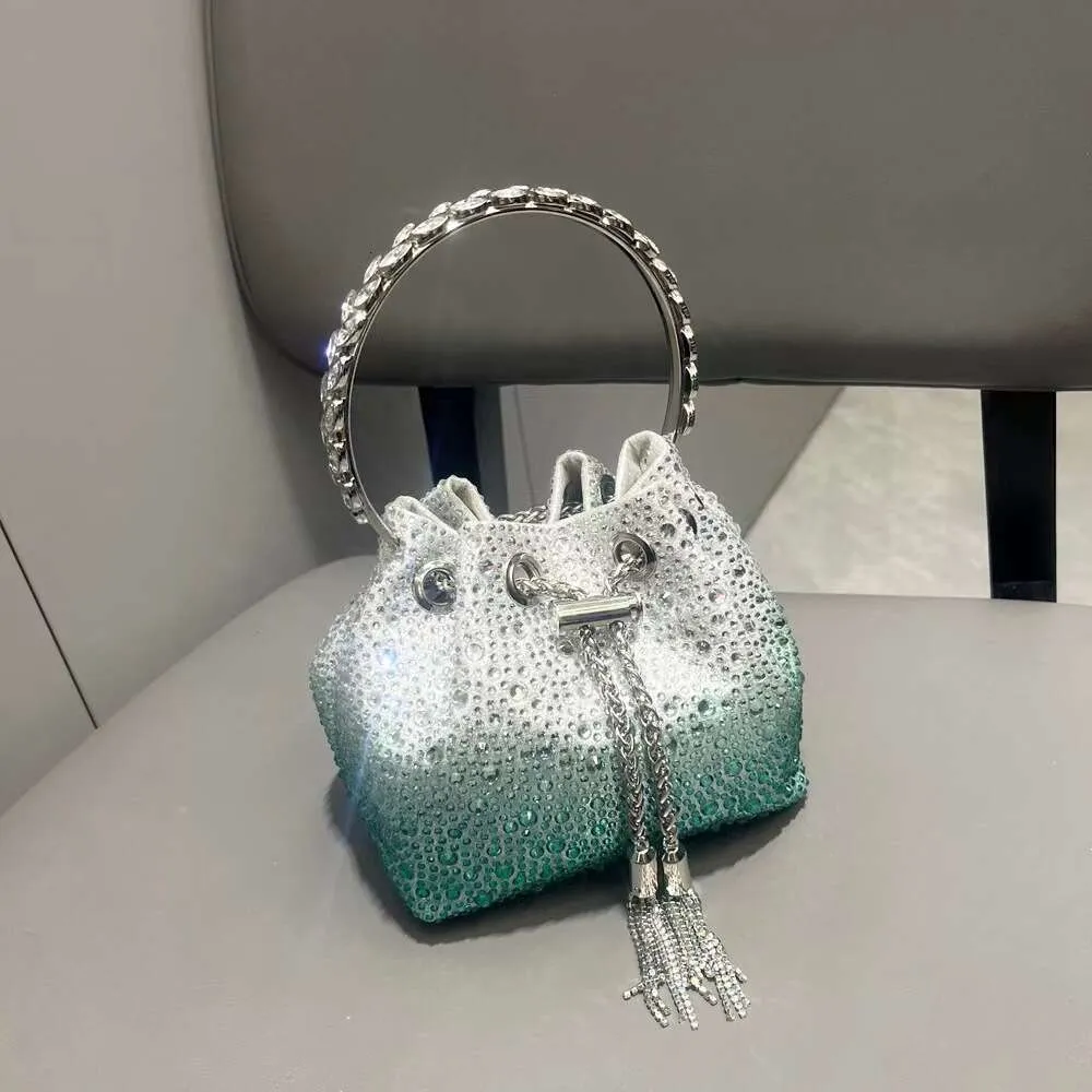 2024 Handtasche Neue Metall Handheld Brieftasche Quaste Hot Dia Kette Crossbody Eimer Schultertasche_voghion.com