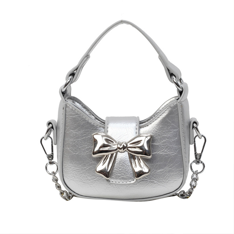 Little girl children's bag, 2024 new retro oily leather handbag, shiny bow chain crossbody bag, little princess mouth red envelope for women_voghion.com