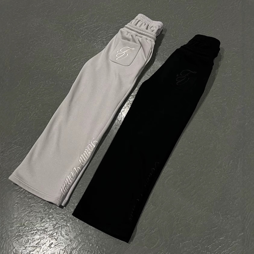 Vêtements pour hommes 25e printemps unisexe tendance décontracté sport tout match brodé pantalons de survêtement pantalons droits
