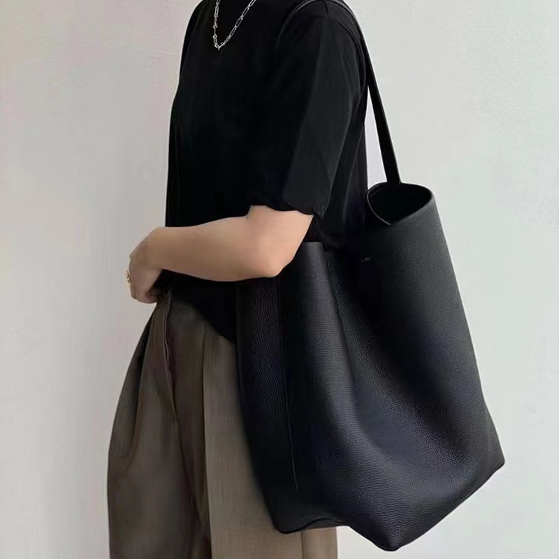 The Row, fascia media a secchiello in vera pelle con pelle di vacchetta per l'autunno inverno, borsa tote di piccola e grande capacità_voghion.com
