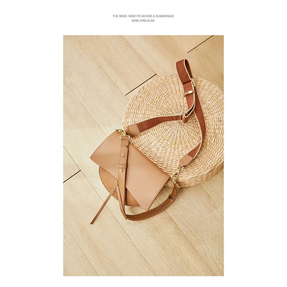 Toks pats stilius kaip ir „Blogger“ moteriškas odinis platus diržas, pusapvalis retro stiliaus karvės odos vieno peties krepšys per petį._voghion.com