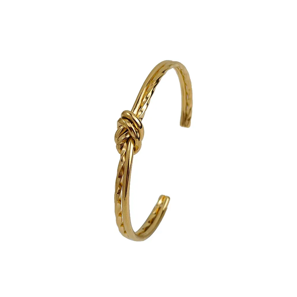 Knotted cuff armband i rostfritt stål guldpläterad dam_voghion.com