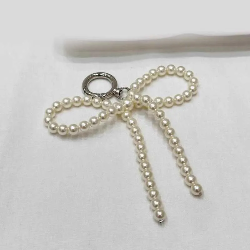 Porte-clés décoratif avec pendentif en forme de nœud de perle à la mode, doux et mignon, breloque pour portefeuille, sac à dos, sac à main Y241121_voghion.com