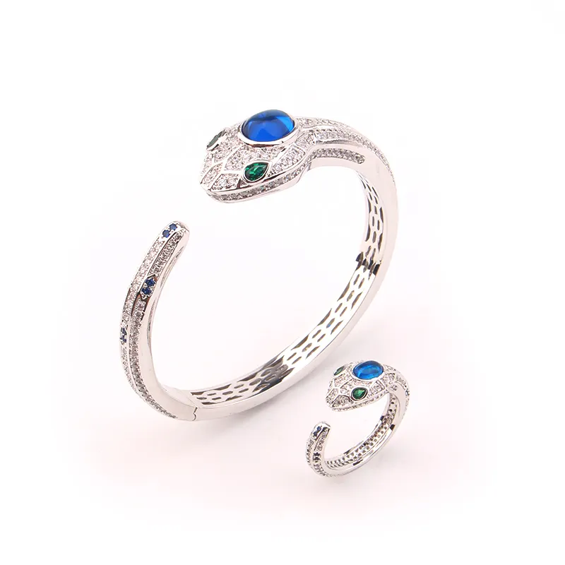 Set de pulsera rígida de serpiente y anillo en plata y oro mujer_voghion.com