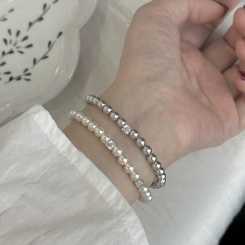 Piccolo squisito cubo di zucchero in zircone Shijia perla elastico leggero elegante braccialetto francese gioielli per ragazze all'ingrosso_voghion.com