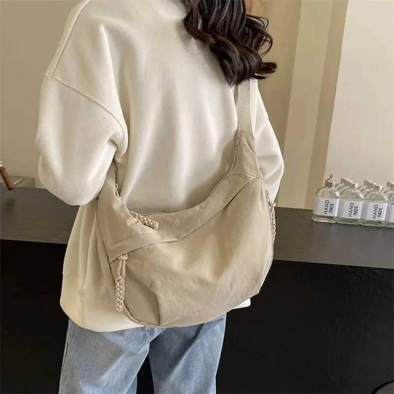Sac à bandoulière en nylon 2024 pour femme, nouvelle collection été, grande capacité, design polyvalent et de niche, messager Ba241103_voghion.com