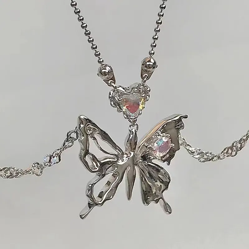 Collier avec pendentif en forme de cœur et de papillon en cristal de couleur argent pour femme, chaîne de clavicule à double couche, tendance et tendance_voghion.com