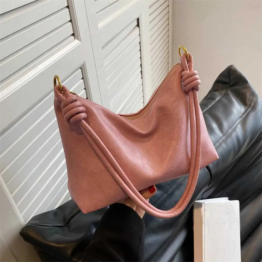 Borsa a tracolla da donna con texture in pelle morbida geometrica_voghion.com