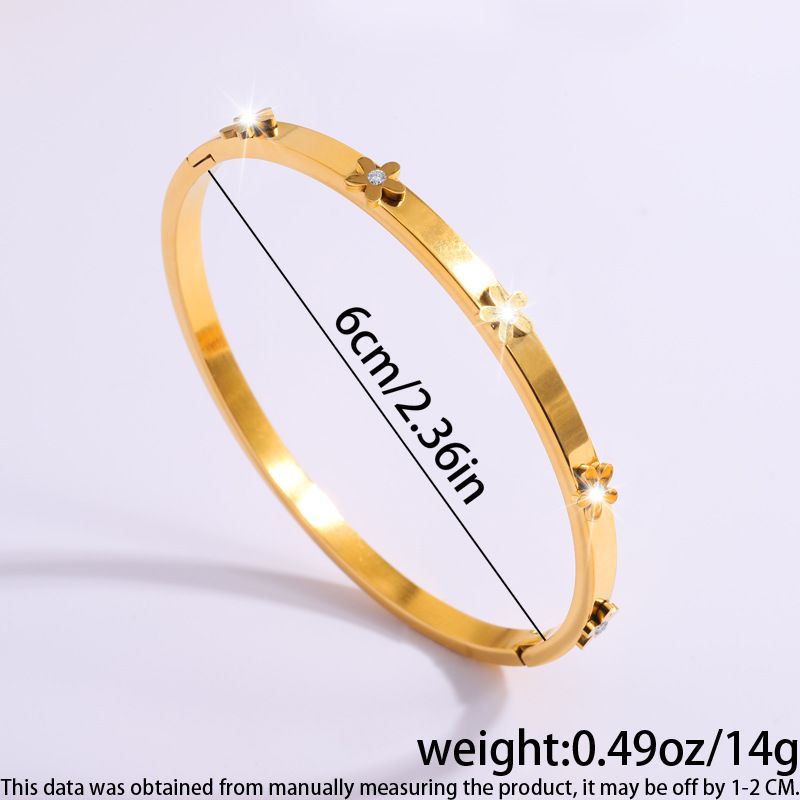 Bracciale rigido in acciaio al titanio e zircone a forma di cuore rotondo stile IG, in blocco_voghion.com