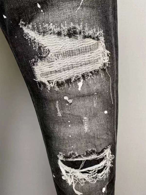 2025 Black Washed Distressed Patch Versatile Paint Street Slimming Micro Elastic Jeans_voghion.com