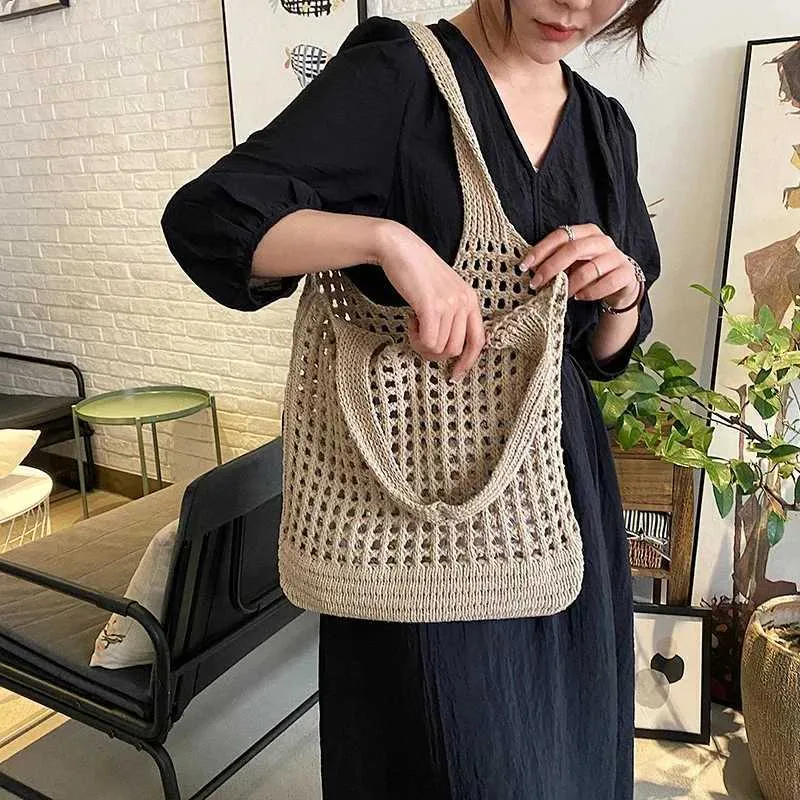 Knitted hollow shoulder lower arm bag large capacity crochet hook womens shopping casual beach handbag Y241011_voghion.com