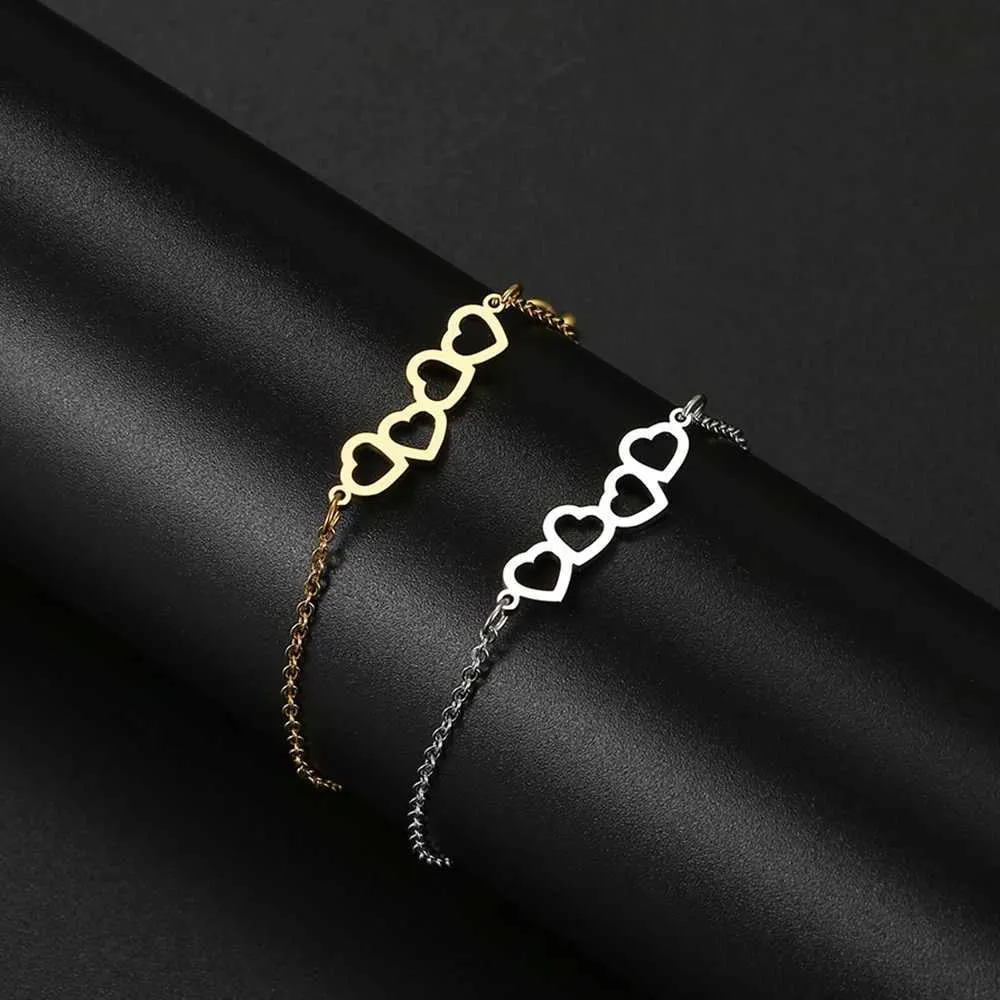 Pulsera de brazalete con dije de corazón hueco acero inoxidable_voghion.com