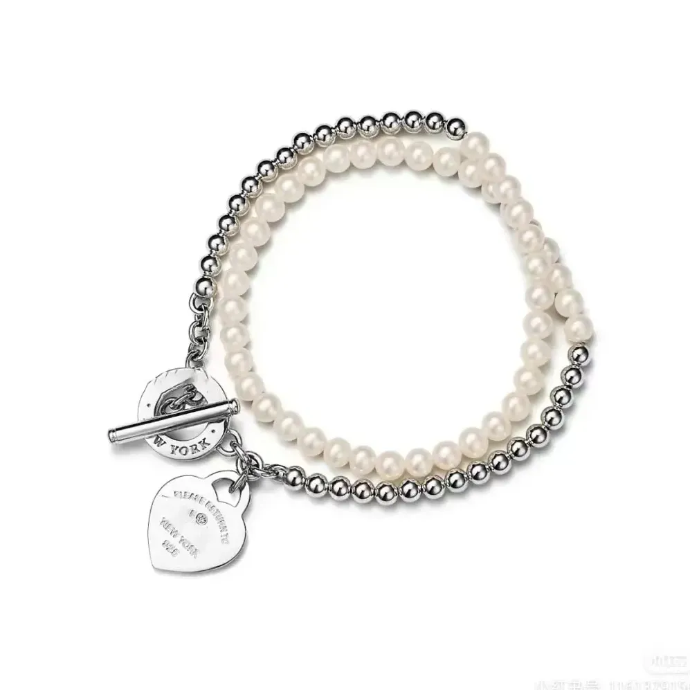Collana di stilista di moda torna a ciondolo gioielli a forma di cuore catene a due piani con collane di perle festa oro rosa_voghion.com