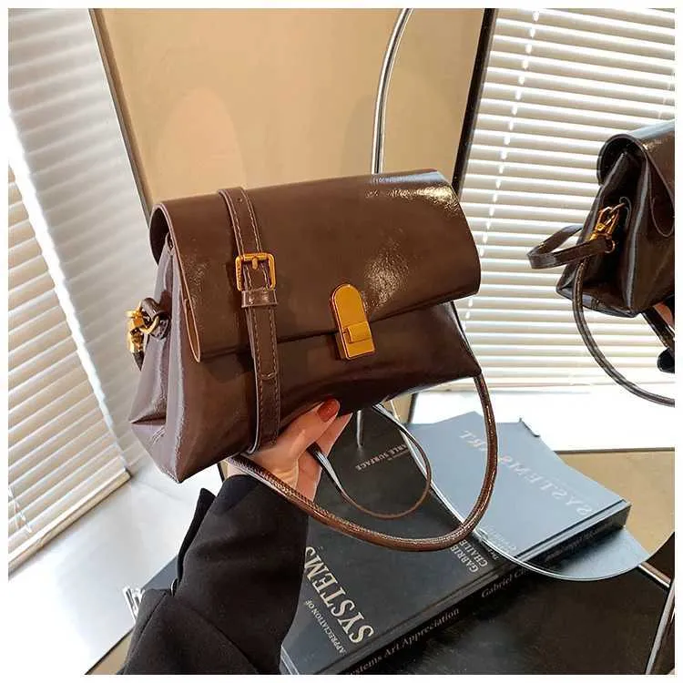 Strukturerad axelremsväska och crossbody väska för damer_voghion.com
