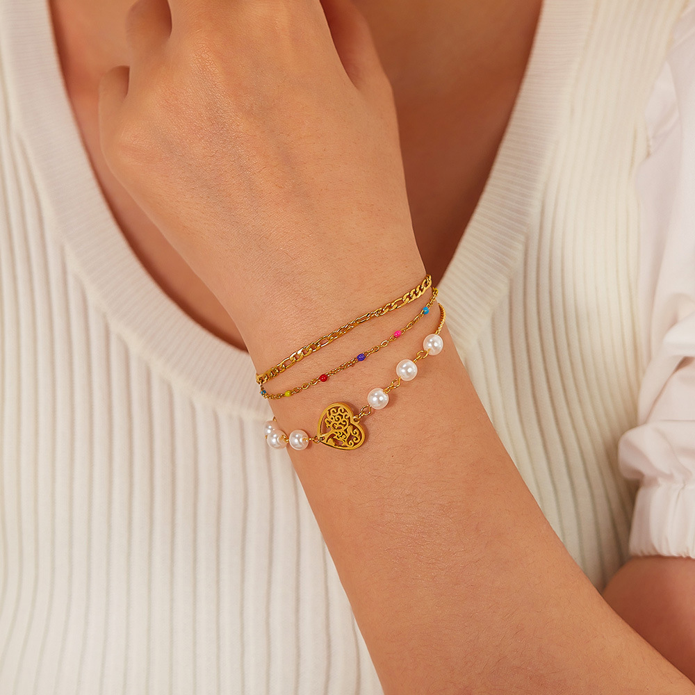 Bracciale a forma di cuore scavato in acciaio inossidabile a doppia catena a tre strati_voghion.com