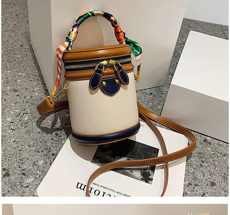 Neue, von einem Nischendesigner entworfene zylindrische Tasche, eine Retro- und modische Umhängetasche für Damen_voghion.com