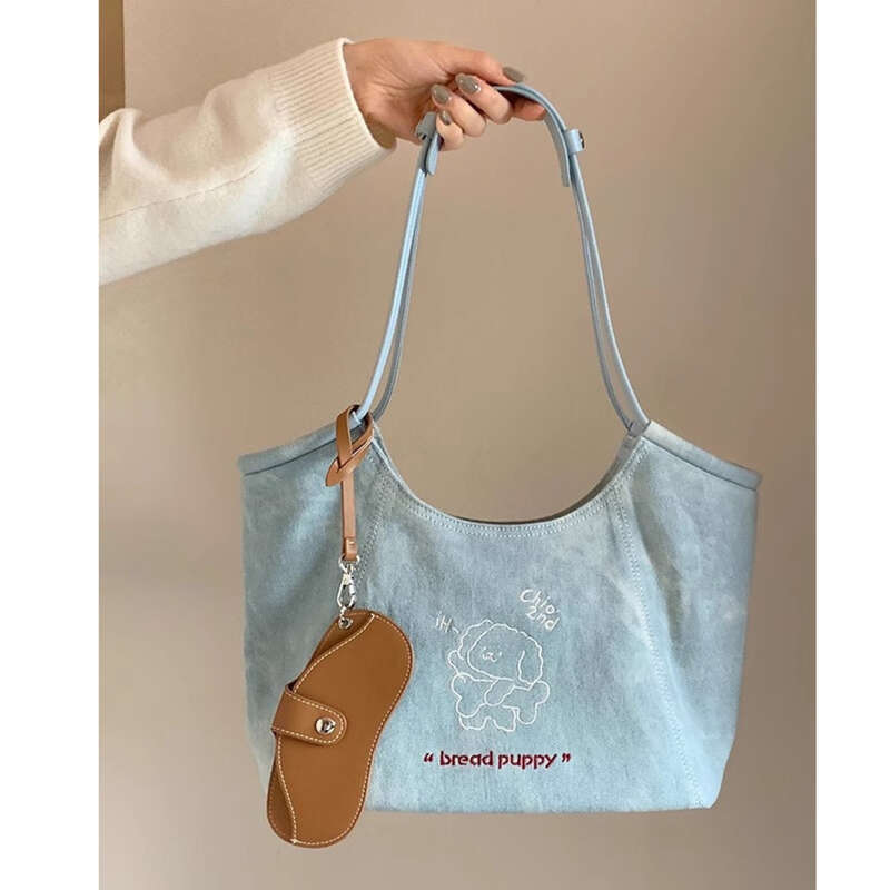 Borsa a mano da pendolare di grande capacità da donna_voghion.com
