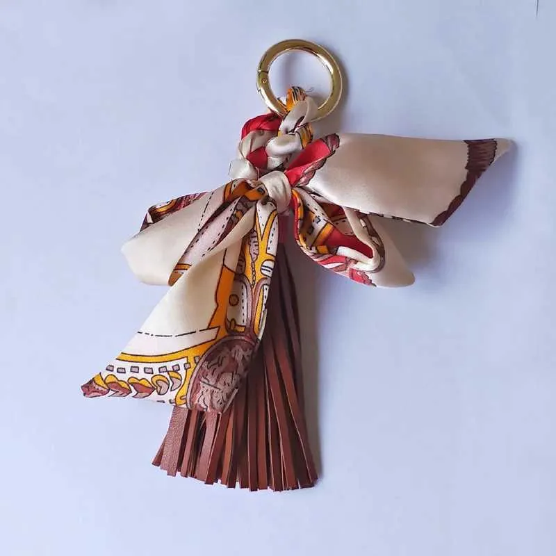 Pingente de lenço com borla de couro macio e fofo, acessório para bolsa, novo chaveiro, porta-chaves de carro da moda K1690 Y241121_voghion.com
