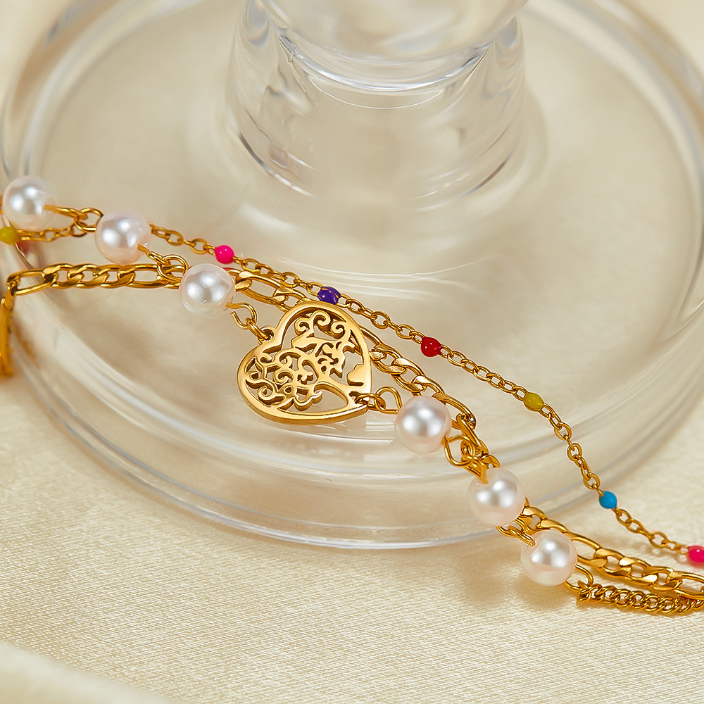 Bracciale a forma di cuore scavato in acciaio inossidabile a doppia catena a tre strati_voghion.com