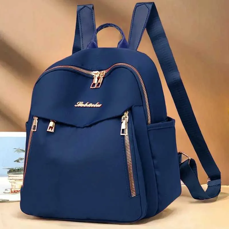 Sac à dos tendance en nylon imperméable à fermeture éclair de grande capacité avec filetage 2024 Hot Selg Sac polyvalent pour femme Mochila Mujer Y241116_voghion.com