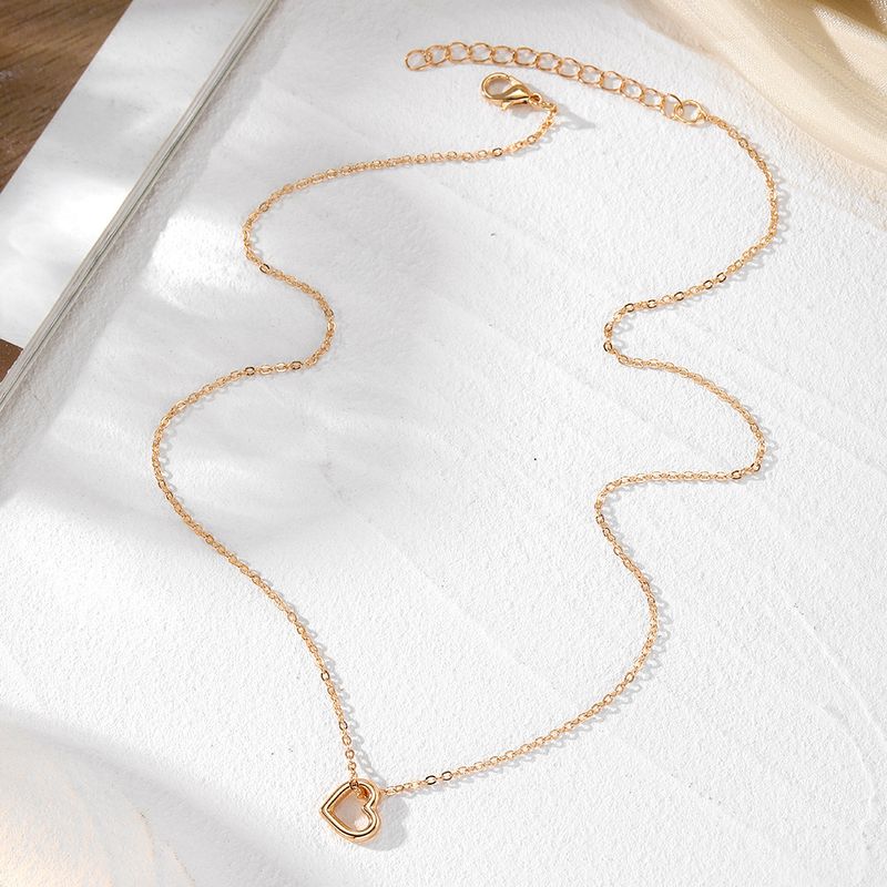Liebesanhänger Halskette für Frauen hohler Stil hochwertiger Sinn für alle Spielpullover Schlüsselbeinkette Schmuck_voghion.com