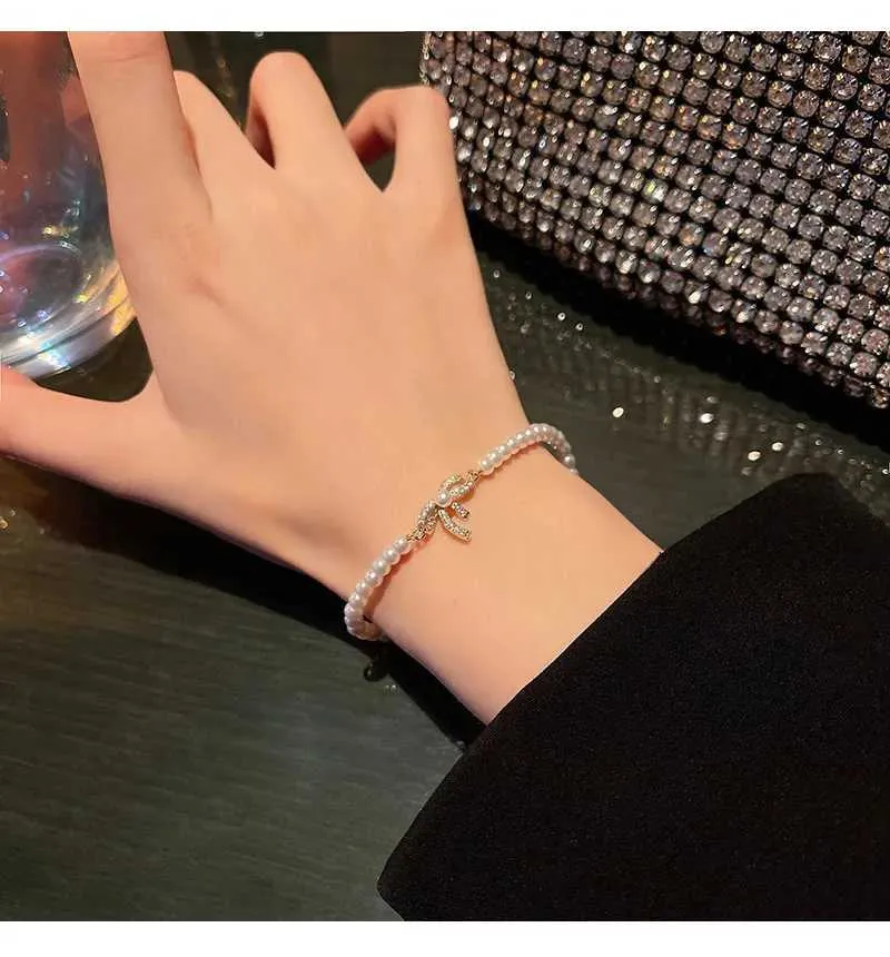 Bracelet ajustable avec perles et strass pour femme doré_voghion.com