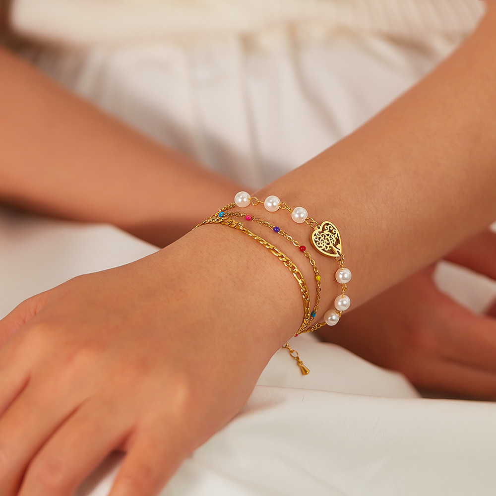 Bracciale a forma di cuore scavato in acciaio inossidabile a doppia catena a tre strati_voghion.com