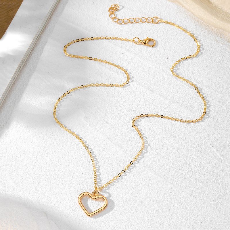 Liebesanhänger Halskette für Frauen hohler Stil hochwertiger Sinn für alle Spielpullover Schlüsselbeinkette Schmuck_voghion.com